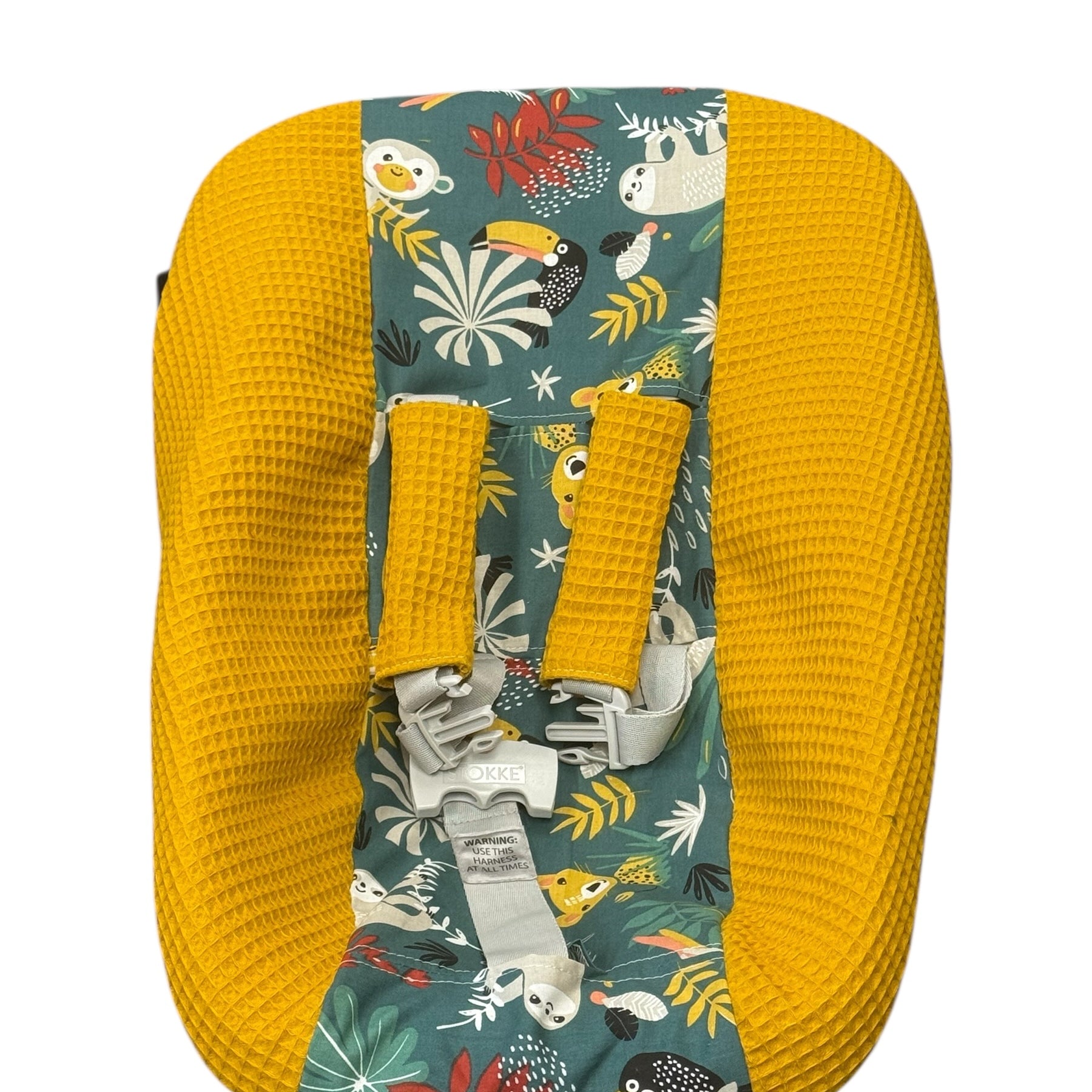 Stokke newborn hoes okergeel groen jungle